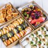 Assorted sushi and fresh fruit platter from The Moody Chef.