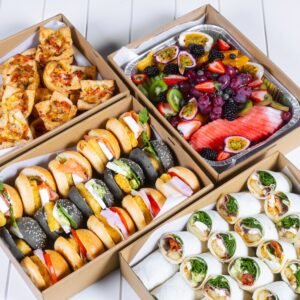 Assorted sushi and fresh fruit platter from The Moody Chef.