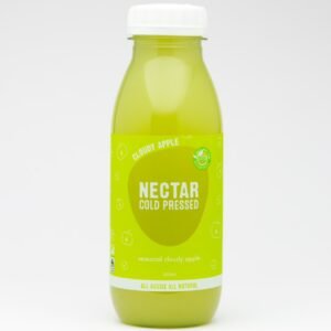 Cold pressed cloudy apple juice in a green bottle with white cap.
