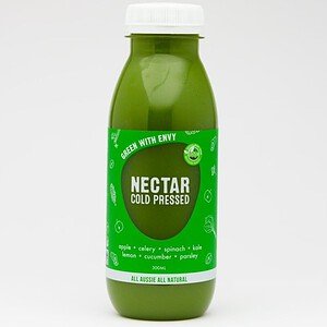 Green bottle of Nectar cold pressed juice with apple, celery, spinach, and kale.